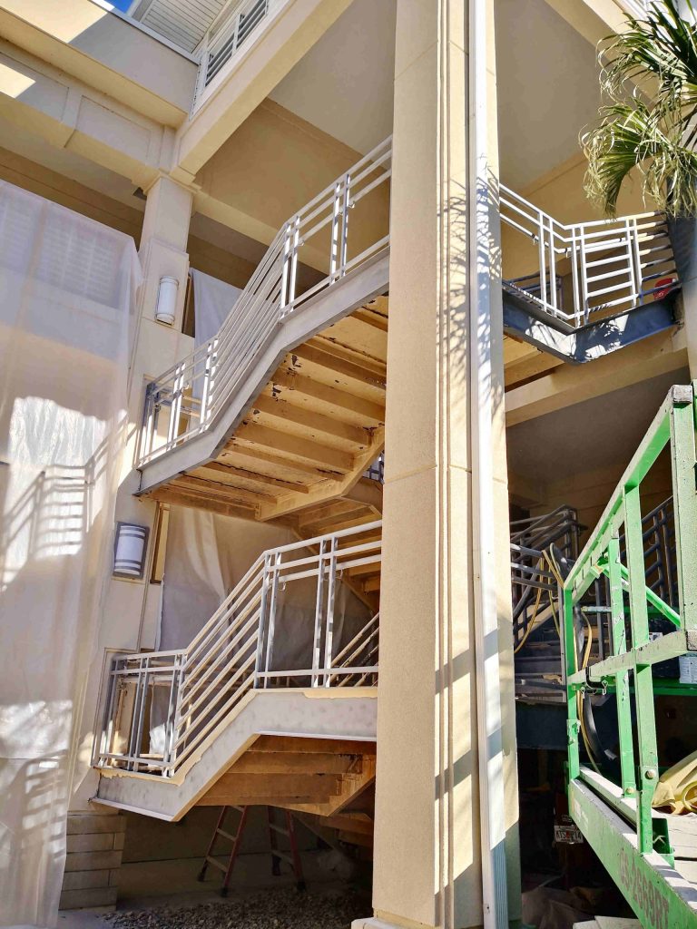 Commercial steel staircase repair sandblast paint removal in Ocala, FL - Ocala Sandblasting