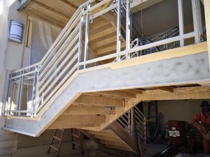 Commercial steel staircase repair sandblast paint removal in Ocala, FL - Ocala Sandblasting
