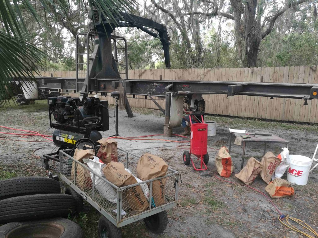 Log Tractor Trailer sandblasting in Ocala, FL - Ocala Sandblasting