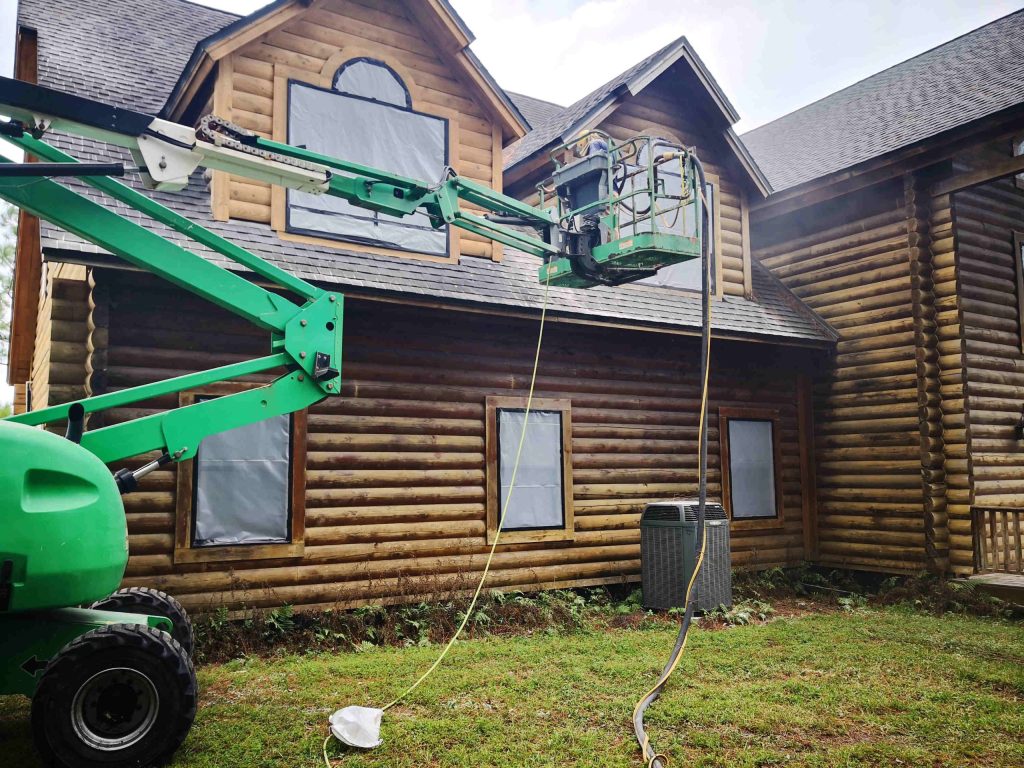 Log cabin house sandblasting stain removal restoration in Ocala, FL - Ocala Sandblasting